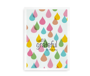 Plakat med farverige dråbeformede mønstre og teksten "I will be grateful for this day" i midten, der udtrykker taknemmelighed og positivitet.