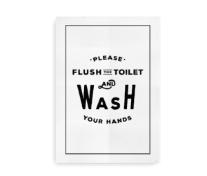 Sort tekst på hvid baggrund med beskeden: "Please flush the toilet and wash your hands" omgivet af en sort ramme.