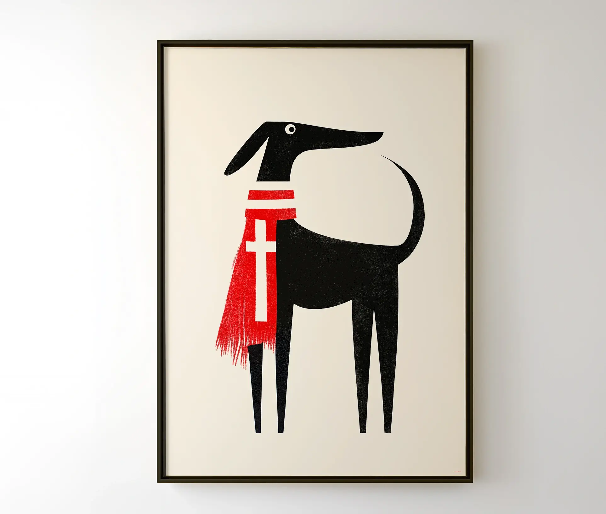 Indrammet plakat af en sort hund med rødt tørklæde hængende på en væg.