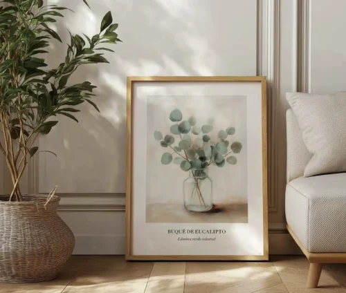 Stor plakat med en eukalyptus-buket, placeret på gulvet op ad en væg.