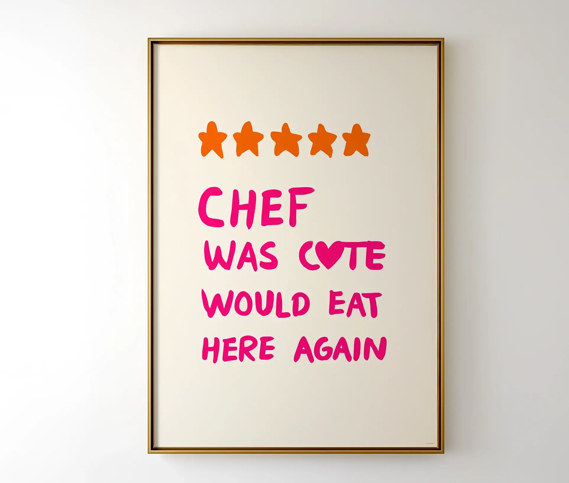 Indrammet plakat med teksten "Chef was cute – would eat here again" hængende på væg