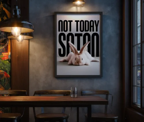 Plakat med hvid kanin og teksten "Not Today Satan" ophængt på væg