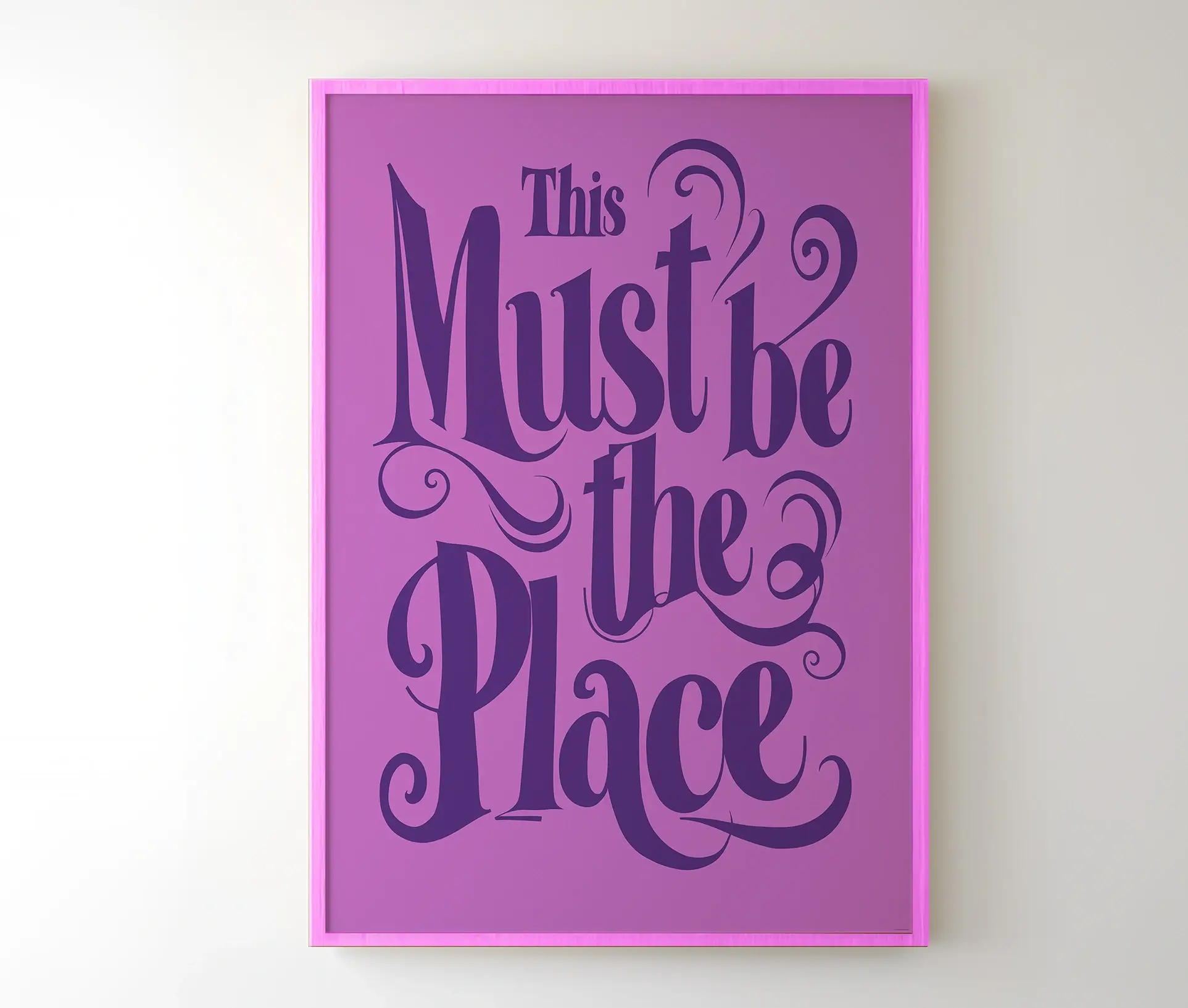 Plakat med teksten "This Must Be the Place" i ramme