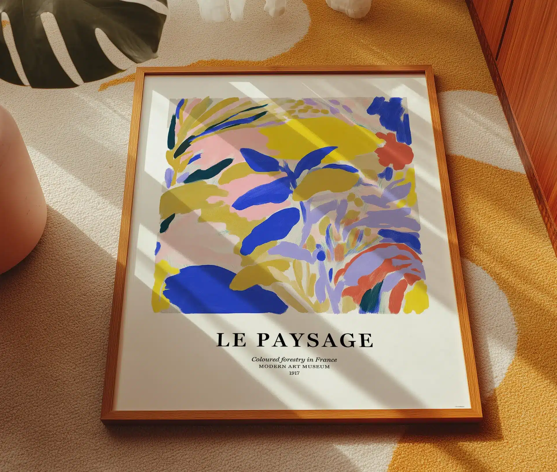 Plakat med abstrakt farverigt kunstmotiv og teksten "Le Paysage"