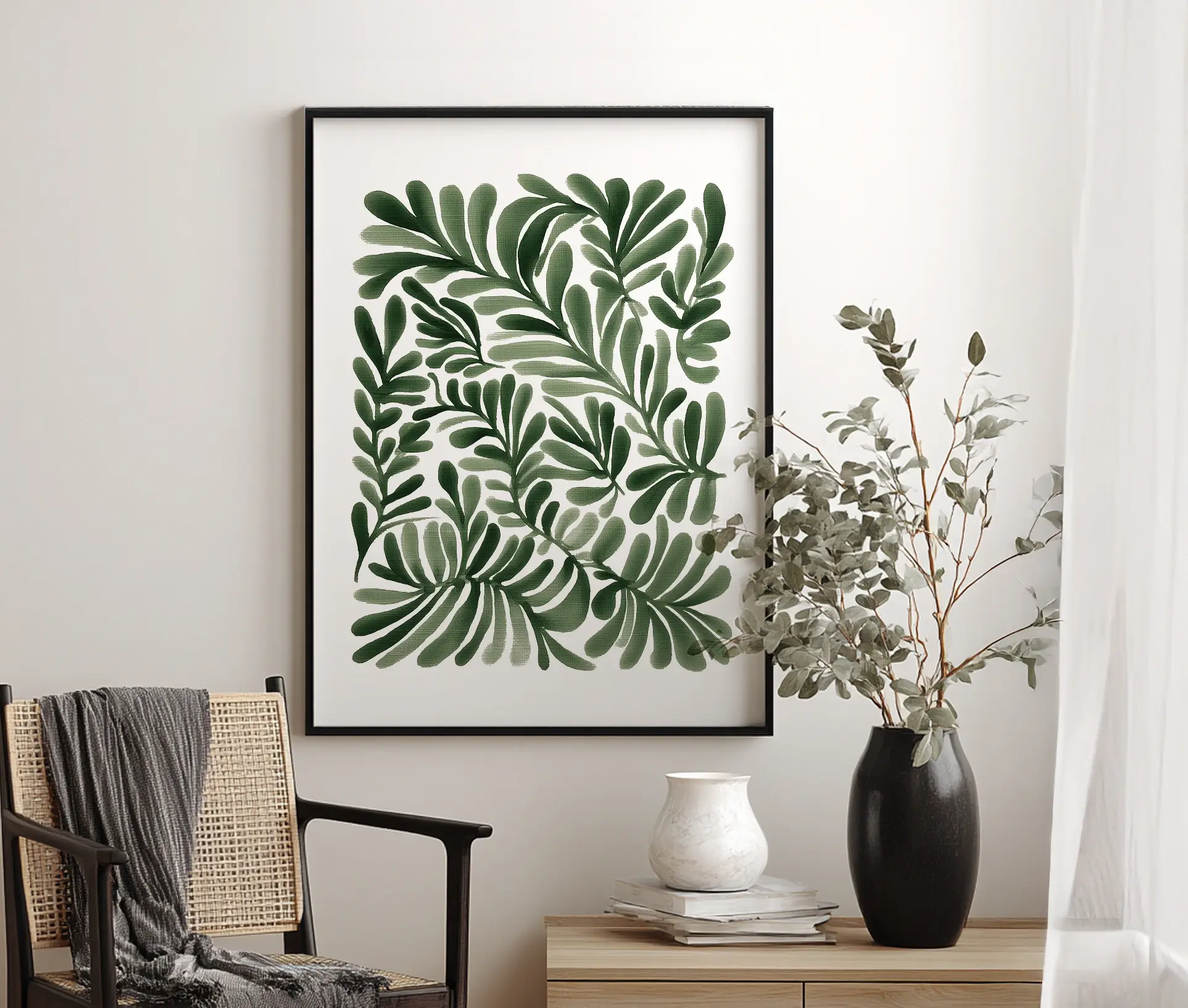 Plakat med grønne blade hængende i indrettet rum