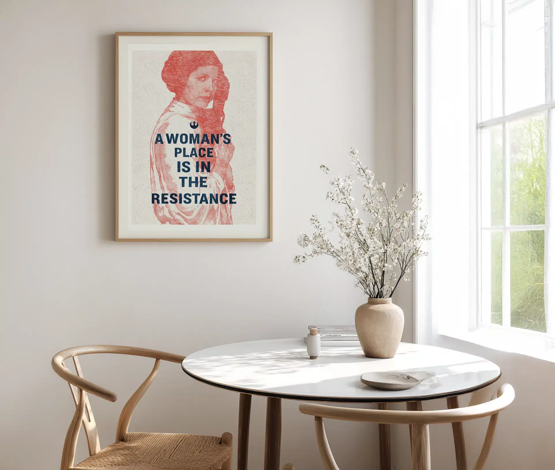 Plakat med A Woman’s Place is in the Resistance og grafisk portræt