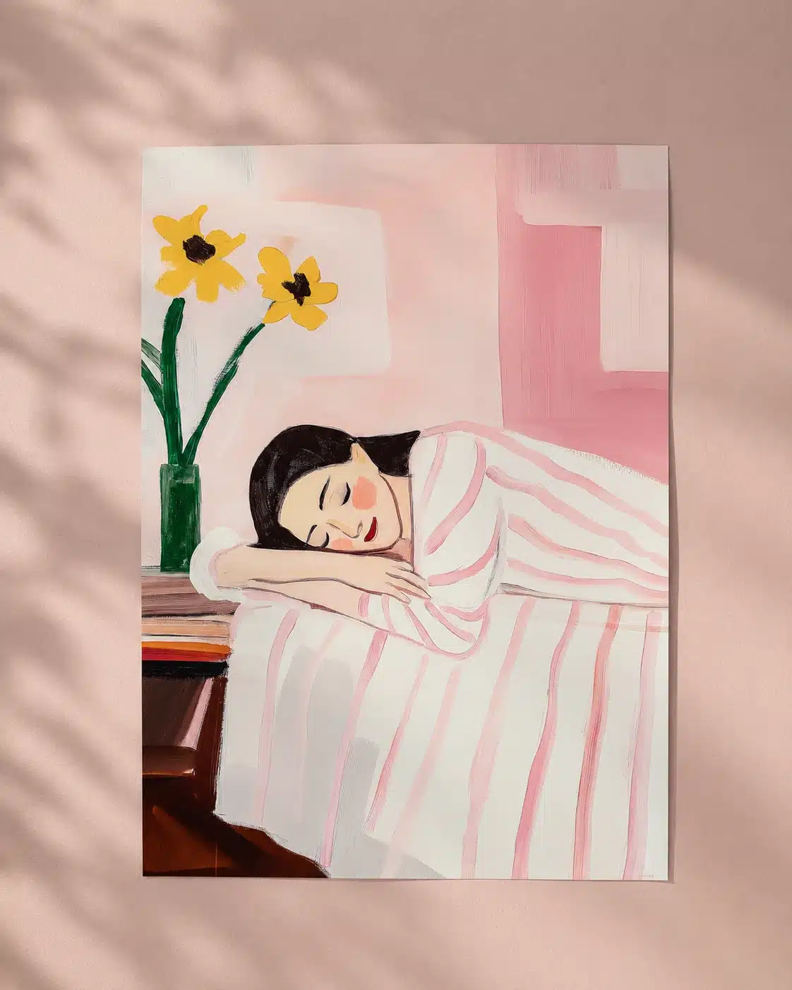 Pink kunstplakat med sovende kvinde vist uden ramme på rosa baggrund