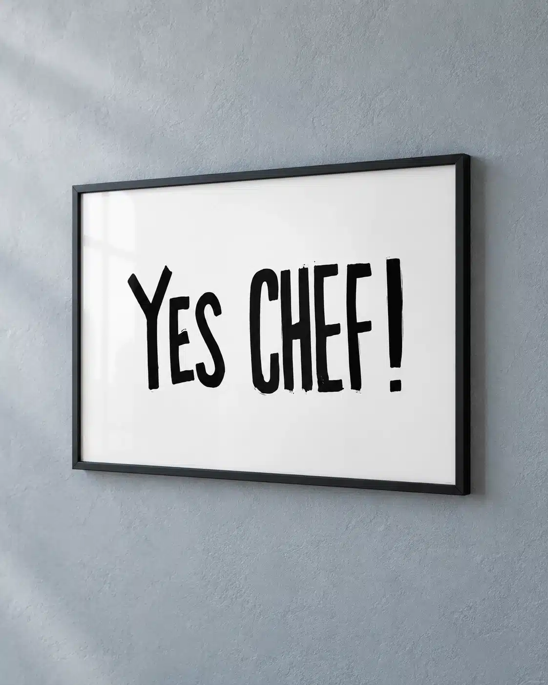 Typografisk Yes Chef køkkenplakat med sort tekst på hvid bund